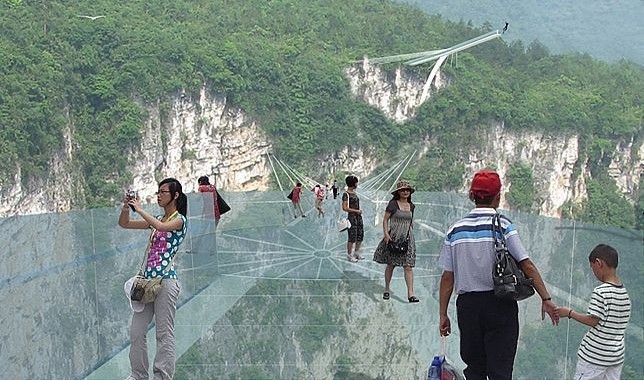 China opens the world’s longest glass bottom bridge.