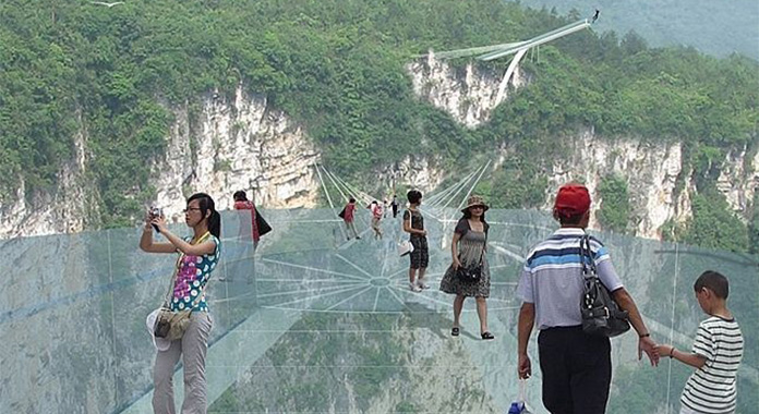 China opens the world’s longest glass bottom bridge.
